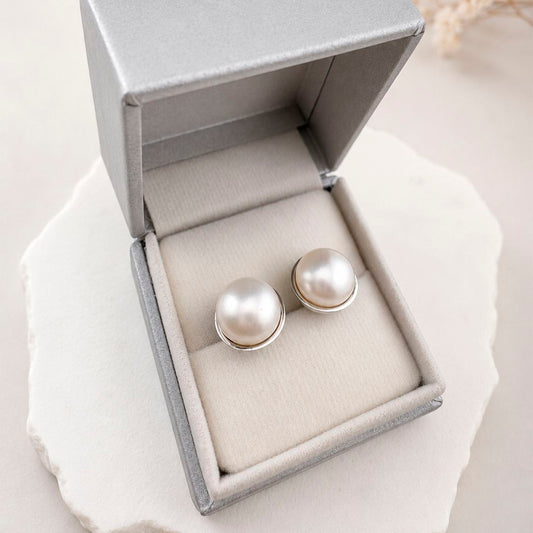 Pearl earrings in 950 silver